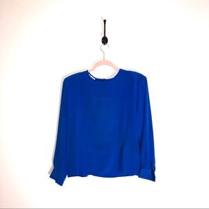 Clio vintage 💯 silk short sleeve blouse